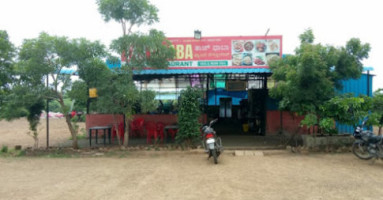 Taj Dhaba And Family outside