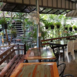 Khrua Rom Mai Chai Khlong ครัวร่มไม้ชายคลอง