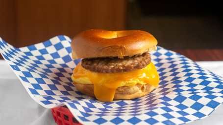 Egg On The Bagel With Cheese And Sausage