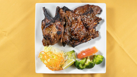 37. Moo Yang Ta Krai (Lemongrass Pork Chop)