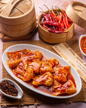 Steamed Seafood Dumplings In Sichuan Broth