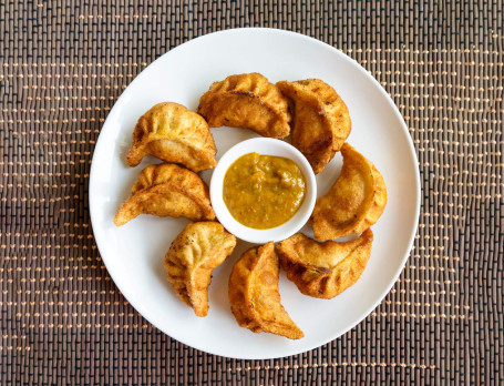 Pollo Fritto Momos (8 Pz)