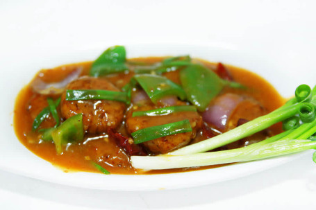 Vegetable Coin With Schezwan Sauce (Gravy)