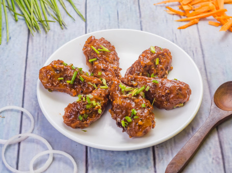 Chicken Pan Fried Momos (Schezwan Sauce)