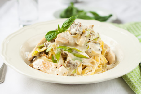 Spaghetti With Exotic Veggies In Alfredo Sauce