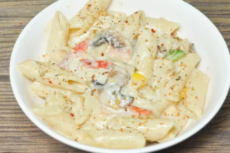 Penne With Corn Capsicum In Creamy White Sauce