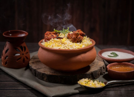 Lucknowi Chicken Dum Biryani (Boneless)