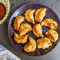 Pan Fried Veg Momos (Tossed With Sauce)