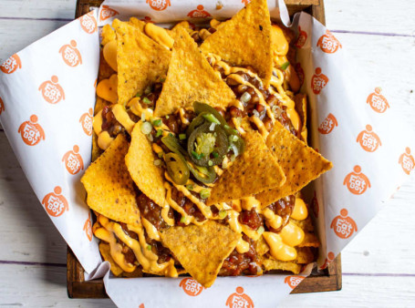 Cheesy Nachos With Chipotle Chicken Jalapeno