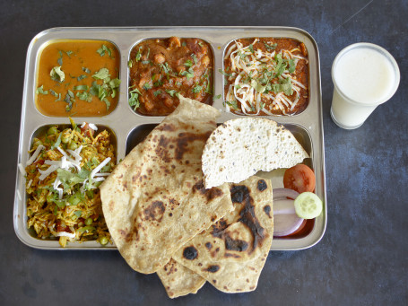 Special Punjabi Thali(Paneer Sabji Veg Sabji Dal Fry Pulao Papad Chaas Salad Paratha 2 Or Roti 4.