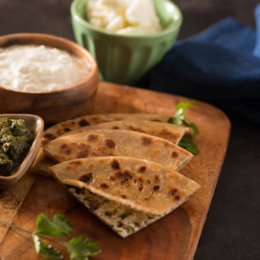 Desi Ghee Paneer Pyaaz Parantha Served With Curd, Chutney And Achaar