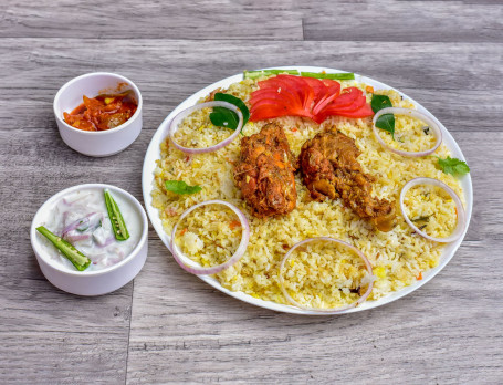 Malabar Dum Chicken Biryani (Served With Raita, Salad And Chutey)