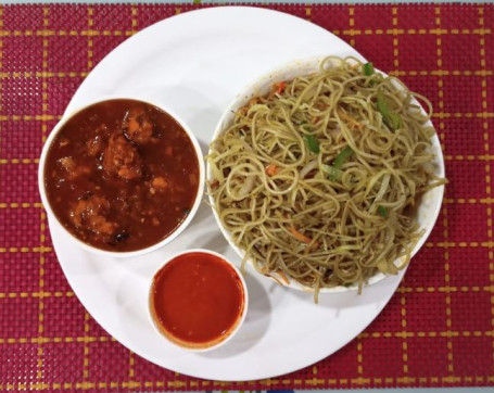 Veg Chow Main Served With Veg Manchurian Chutney