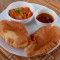 Rajgira Poori With Aloo Ki Sabji (2 Pcs) (Served With Pindkhajur Ki Launji Rajgira Sev)