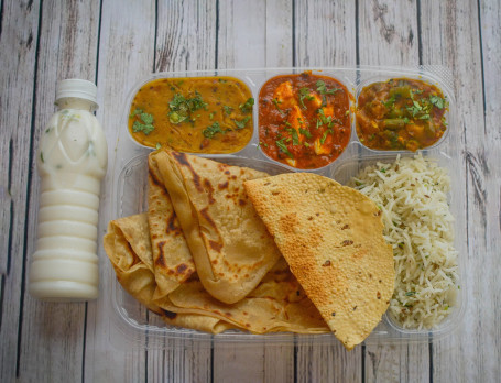 Special Punjabi Thali With Buttermilk (1 Paneer Sabji Or Veg Sabji 4 Butter Roti Dal Fry Jeera Rice 1 Buttermilk Salad Achar Sweet Mukhwash)