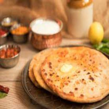 Aloo Stuffed Paratha (1 Pcs) With Pickle Sauce