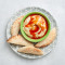 Hummus Cremoso Con Peri Peri Drizzle Pita