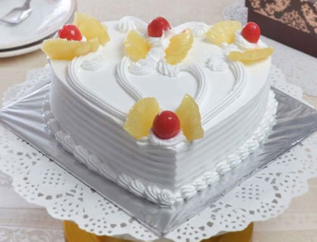 Eggless Pineapple Heart Shape Cake [1/2 Kg]