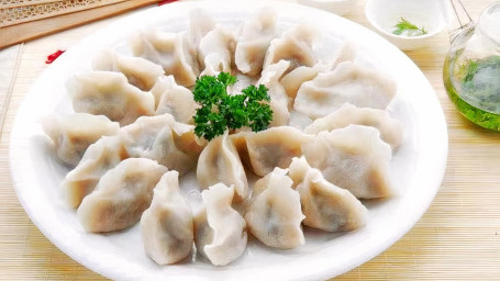 A8. 6 Piece Steamed Vegetable Dumplings