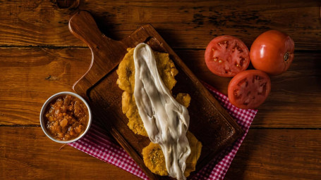 Fried Plantanis With Cheese, Colombian Sauce (3) Tostones Queso Y Hogao (3)