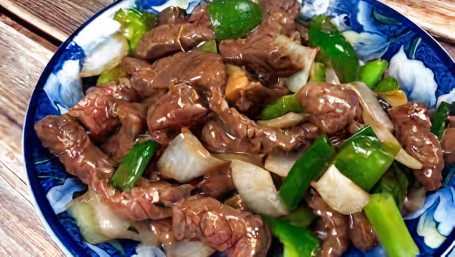 L19. Pepper Steak With Onions Qīng Jiāo Niú