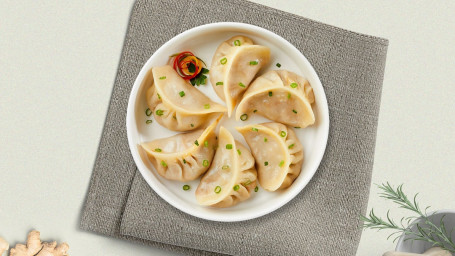 A6. Steamed Chicken Or Pork Dumpling