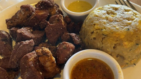 Mofongo De Platano Con Masitas De Cerdo