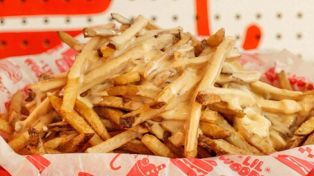 House-Made Queso And Fries