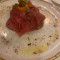 Carpaccio Di Chianina Igp Marinato E Leggermente Affumicato Con Insalata Di Finocchi, Arancia E Polvere Di Liquirizia