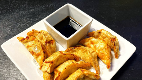 6. Pot Stickers (8 Pc)