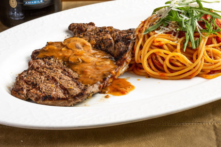 6Oz Ribeye Steak Pizzaiola With Spaghetti Mó Gū Shāo Zhī Ròu Yǎn Bā