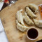 A10. Steamed Dumplings (8 Pieces)