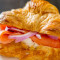 C15. Smoked Salmon, Cream Cheese And Red Onions Sandwich On A Croissant